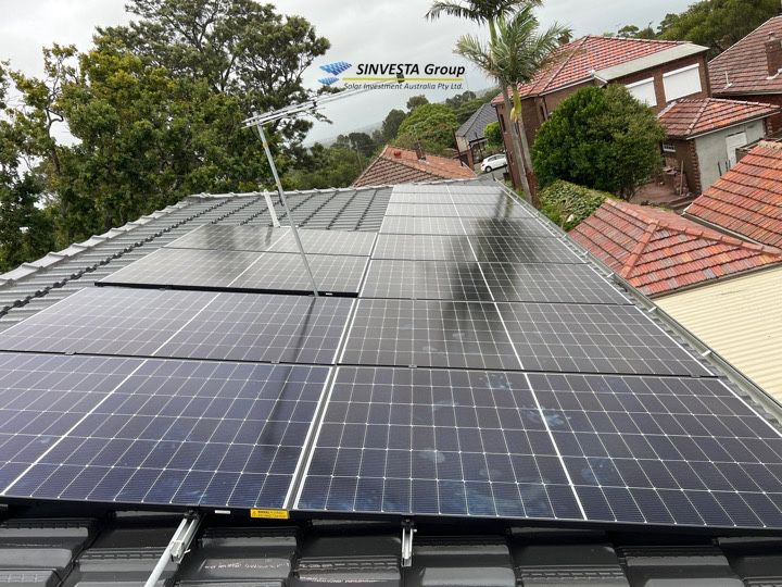 Solar array across a tiled Sydney roof.